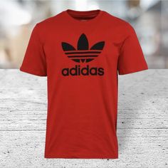 Brand New With Tags Men's Cotton Authentic Adidas Red Graphic Tee With Logo, Red Logo T-shirt With Short Sleeves, Red Logo Tops For Streetwear, Red Crew Neck Top With Logo, Adidas Red Short Sleeve T-shirt, Red Adidas Short Sleeve T-shirt, Casual Red Tops With Logo, Adidas Red Crew Neck T-shirt, Red Adidas Crew Neck T-shirt