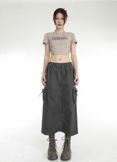 Embrace your adventurous side with this parachute-styled maxi skirt. The gray and black tech-colored piece is a modern take on the classic skirt with a low waist and a drawstring for adjustability. It features six pockets, adding a touch of utility to your fashion statement. The back slit provides an unexpected twist, 90s Fashion Grunge Outfits, Hip Hop Fashion 90s, Aesthetic Clothing Stores, Maxi Skirt Style, Classic Skirts, Skirt Y2k, Corset Bustier, Trendy Summer Outfits, Cargo Skirt