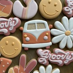 decorated cookies with the words baby, groohy and an image of a vw bus