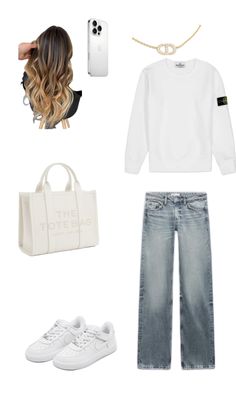 a white sweater, jeans and sneakers are arranged in the shape of a woman's wardrobe