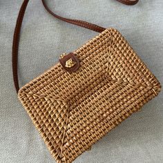 Small Rattan Bag From Greece. Never Worn. Excellent Condition Rectangular Tan Shoulder Bag For Beach, Rectangular Tan Straw Bag For Vacation, Tan Rectangular Straw Bag For Vacation, Tan Woven Rectangular Shoulder Bag, Tan Woven Rectangular Bag, Everyday Brown Rattan Bag, Eco-friendly Rattan Shoulder Bag With Braided Handles, Everyday Basket-shaped Rattan Shoulder Bag, Basket-shaped Rattan Shoulder Bag With Woven Leather