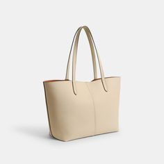 Going places? Take our practical-yet-polished North along for the ride. Crafted of supple double-faced lightly grained leather with an ultra-luxe soft feel this snap-closure tote is finished with an inside zip pocket and our Signature hardware. With space for a 13” laptop it’s a minimalist sophisticated style that’s great for work (and play). | Coach North Tote 32 - Women's - Brass/ivory Coach Textured Leather Shoulder Bag For Shopping, Coach Textured Leather Shoulder Bag For Work, Chic Coach Shoulder Bag With Leather Lining, Versatile Coach Bags In Soft Leather, Classic Coach Shoulder Bag With Large Capacity, Coach Leather Bags With Large Capacity, Classic Shoulder Bag With Smooth Grain For Shopping, Coach Beige Shoulder Bag For Work, Coach Classic Large Capacity Shoulder Bag