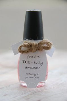 a bottle of nail polish with a tag attached to it that says, you are toe = truly awesome