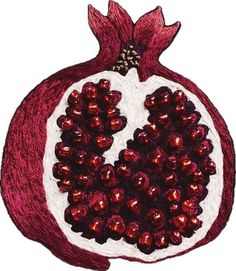 the pomegranate is made from red and white yarn