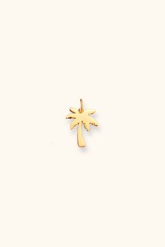 Get into a tropical state of mind with this cute Palm Tree Charm. Hang it on your favorite necklace or bracelet to add a touch of beachy vibes to your look. No need to wait for a vacation, this charm brings the vacation to you! Customize your look at our Bliss Charm Bar! All of our jewelry comes with a free jewelry pouch and cloth to keep your pretties safe and clean. Details Color: 18K Gold PlatedMaterial: Stainless SteelSize: 10mm Care Guide Store in a dry, cool place away from sunlight i.e. B Charm Bar, Palm Tree Pendant, Beachy Vibes, 40th Gifts, Chic Gifts, Butterfly Charm, Pop Up Store, Luxe Gifts, Cuff Earrings