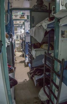 bunk beds are lined up along the wall