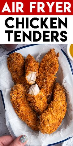 chicken tenders on a plate with dipping sauce