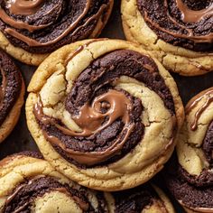 chocolate swirl cookies are arranged on a baking sheet