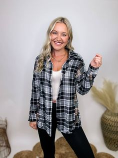 Contrast Flannel Casual Shirt with Frayed Hems Elevate your casual wardrobe with our Contrast Flannel Casual Shirt. This button-down, long sleeve shirt features a timeless black and white plaid pattern with a subtle pop of olive, adding a touch of modern flair. The frayed hem details throughout give it a relaxed, laid-back vibe, perfect for everyday wear. The relaxed fit ensures comfort and versatility, making it an ideal choice for a variety of settings. Wear it to a pumpkin patch outing, a cas Black Long Sleeve Flannel Shirt For Fall, Black Flannel Top For Fall, Black Long Sleeve Flannel Shirt, Trendy Black Flannel Top, Pattern Black And White, Black And White Plaid, Long Sleeve Flannel, Weekend Brunch, Graphic Tops