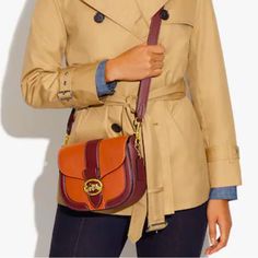 Lux And Comfy Georgie Saddle Bag In Colorblock Nwt Cross Body Purse Refined Pebble Leather And Smooth Leather Inside Multifunction Pockets Snap Closure, Fabric Lining Outside Open Pocket Detachable Strap With 20 3/4" Drop For Shoulder Or Crossbody Wear 8 1/4" (L) X 6 3/4" (H) X 2 3/4" (W) Style No. Ca212o Coach Travel Saddle Bag, Coach Saddle Bag For Travel, Shoulder Bag With Turn-lock Closure, Turn-lock Closure Shoulder Bag For Shopping, Brown Coach Bag With Turn-lock Closure, Coach Purple Satchel With Detachable Strap, Purple Coach Satchel With Detachable Strap, Cross Body Purse, Saddle Bag