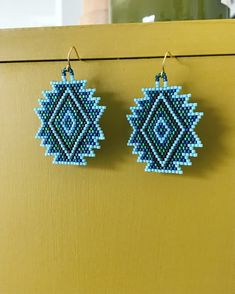 Ocean Blue Geometric Hand Beaded Earrings | Etsy Beaded Western Earrings, Handmade Southwestern Beaded Earrings For Beach, Turquoise Handwoven Beaded Earrings With Round Beads, Handwoven Turquoise Round Bead Earrings, Turquoise Handwoven Round Bead Earrings, Southwestern Turquoise Beaded Earrings, Turquoise Handwoven Drop Beaded Earrings, Beaded Arrowhead Earrings, Southwestern Style Blue Beaded Earrings