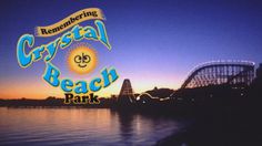 the logo for crystal beach park at sunset with roller coasters and water in the background