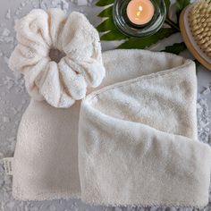 LUXE MICROFIBER HAIR TOWEL The super absorbent microfiber wrap wicks moisture away from wet hair, dries hair up to 50% faster than towels alone and eliminates unwanted frizz. Plus, the unique buttonless design (one size fits all) doesn't snag delicate hair and is easy to use... It's just that simple! Super absorbent luxe microfiber Prevents frizz and breakage Works for all hair types especially long, thick, curly hair and hair extensions One size fits most (adults) and button-free Handmade in Ca Towel Scrunchie, Microfiber Hair Towel, 50 Plus, Hair Towel, Happy Hair, Microfiber Towel, Frizzy Hair, Elegant Hairstyles, Wet Hair