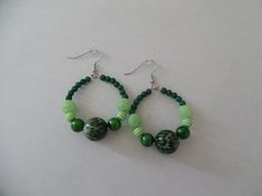 Small green leopard print hoop earrings, Beaded green earrings, Leopard print earrings, Green earrin Handmade Adjustable Green Hoop Earrings, Adjustable Handmade Green Hoop Earrings, Green Beaded Hoop Earrings For Gift, Adjustable Green Hoop Earrings, Green Beaded Dangle Hoop Earrings, Handmade Green Beaded Hoop Earrings, Green Large Beads Round Jewelry, Green Bohemian Small Hoop Earrings, Bohemian Green Small Hoop Earrings