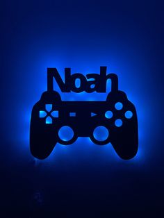 a video game controller with the word noah on it's back lit up in blue