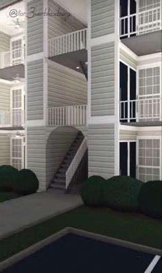 an artist's rendering of a building with stairs and balconies