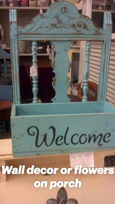 a sign that says welcome on the side of a bed