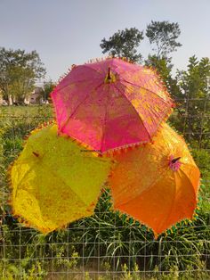 Beautiful Indian Golden Printed Silk Fabric umbrella is handcrafted by village artists in Rajasthan and complete decorated with Golden Print & Aari Tari Lace with iron handle . These handicrafts are designed in various color combination and are offered in a multitude of motifs, patterns, various other specifications. This handcrafted umbrella made up of Silk cloth is essential for the approaching summer season. Enhance your special occasions with these exquisite Multi parasols. Not only beautifu Haldi Decoration With Umbrella, Bohemian Multicolor Umbrellas For Summer, Traditional Multicolor Umbrellas For Summer, Bohemian Multicolor Beach Umbrella, Floral Umbrella Wedding Indian, Traditional Multicolor Beach Umbrellas, Traditional Multicolor Umbrella For Festival, Printed Silk Fabric, Ethnic Wedding