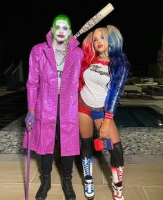 two people in costumes standing next to each other