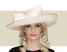 This soft gold Arbor hat is a modern take on the classic ladies hat. Get it here today along with many other elegant hats from Gold Coast Couture. Luxury Gold Wide Brim Hat, Luxury Gold Hat For Kentucky Derby, Elegant Gold Top Hat For Formal Occasions, Elegant Gold Hat For Evening, Elegant Gold Evening Hats, Elegant Gold Top Hat For Church, Elegant Gold Top Hat For Royal Ascot, Elegant Curved Brim Top Hat For Formal Occasions, Elegant Gold Fitted Top Hat