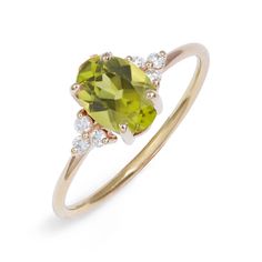 Handcrafted in 14-karat recycled gold, a beautifully prong-set oval-shaped 0.90ct aquamarine with six light-catching diamonds makes an elegant statement.  To customized with other gemstones, please email info@poppyfinch.com. Peridot Engagement Rings, Pink Morganite, Elegant Ring, Diamond Cluster Ring, Precious Gems, Recycled Gold, Ring Size Guide, Diamond Cluster, Conflict Free Diamonds