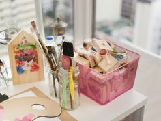 some crafting supplies are sitting on a table