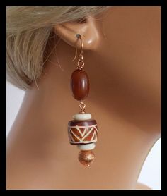 TRIBAL BONE Handmade African Carved by sandrawebsterjewelry Bohemian Carved Brown Jewelry, Brown Artisan Jewelry With Dangling Beads, Artisan Brown Jewelry With Dangling Beads, Bohemian Brown Carved Jewelry, Bohemian Earrings With Wooden Beads, Bohemian Brown Fair Trade Jewelry, Traditional Wooden Beads Dangle Jewelry, Traditional Dangle Jewelry With Wooden Beads, African Jewellery