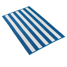 a blue and white striped rug on a white background