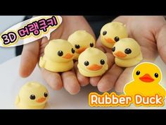 a person holding five rubber ducks in their hands with the words rubber duck on it