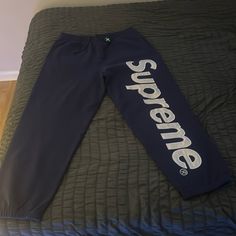 Supreme Washed Navy Sweatpants Brand New Never Worn Except To Try On. I Ordered Them From Stock X, They Were Too Big For Me Had To Order A New Size. They Are An Extra Large Still With The Stock X Verification On Them. Blue Straight Leg Pants With Letter Print, Sporty Blue Pants With Letter Print, Blue Straight Hem Lounge Pants, Blue Straight Hem Loungewear Pants, Blue Straight Hem Pants For Loungewear, Sporty Blue Pants With Straight Hem, Blue Bottoms With Letter Print And Relaxed Fit, Blue Straight Hem Bottoms For Streetwear, Blue Athleisure Bottoms With Letter Print