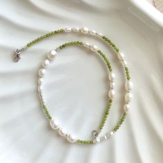 ✋100% HANDMADE ☘️ This handmade necklace is composed of light green jade, freshwater pearls, and silver glass beads. The color is fresh and elegant. It is very suitable for giving it as a gift to mother, girlfriend, wife, or yourself.     📏SIZE: 46cm long / 18 inch * If you need other lengths, please contact me or leave a message in the order. 📿 MATERIALS: 5-10mm natural freshwater pearl 3mm jade  3mm miyuki glass beads 14K Gold plated clasp 📦 PACKAGING: Each piece comes with a dust/moisture proof bag and a cotton bag for storage when not worn. They will be sent in a well-wrapped condition. If you have any ideas for the packaging, such as adding gift cards and messages, etc., please feel free to contact me. ✈️ SHIPPING AND DELIVERY: I fully understand your concerns about international s Choker Handmade, Gemstone Choker, Jewelry Personalized, Necklace Pearl, Pearl Gemstone, Freshwater Pearl Necklaces, Green Jade, Jade Green, 14kt Gold