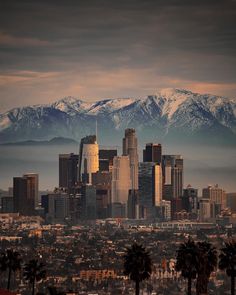 the city is surrounded by snow capped mountains