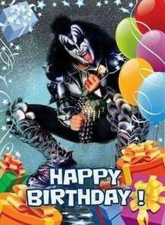 a birthday card with an image of kiss on the face and balloons in the background