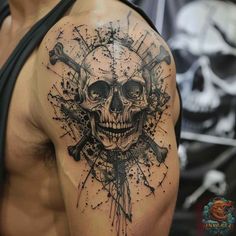 a man with a skull and crossbones tattoo on his arm