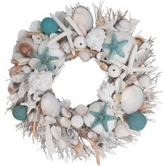 a wreath with sea shells and starfishs on it is displayed against a white background