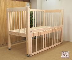 a baby crib in the corner of a room