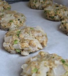 some food is laying out on top of the paper and ready to be cooked in the oven