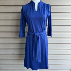 This Is A Flattering Three-Quarter Sleeved Belted Dress From Glamour, Women’s Size Medium. The Knit Fabric, 75% Polyester/20% Rayon/5% Spandex, Is A Rich Violet. Features A Split V-Neckline, Front And Back Seaming, And Fabric Belt. This Is A Lovely Classic Dress That Can Is Appropriate Business Wear That Carries You On To Evening Events - Super Versatile! Measurements (Approximate, Flat): Bust-19” Length-37” This Dress Is Euc, With No Noted Flaws. Ioffers And Bundles!! Blue 3/4 Sleeve Dresses For Fall, Blue 3/4 Sleeve Dress For Fall, Elegant Mini Dress With 3/4 Sleeves For Daywear, Elegant Blue Dress With 3/4 Sleeves, Blue Fitted Midi Dress With 3/4 Sleeves, Blue Stretch Dresses For Work, Blue Fitted Mini Dress With 3/4 Sleeve, Blue Stretch Dresses For Daywear, Stretch Blue Dresses For Daywear