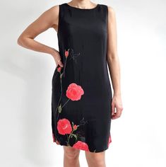 Beautiful, simple mini dress in black, with minimalist, pink rose floral print. It has a straight shape, chest darts and one button at the back. Made from viscose fabric without lining. Perfect lightweight dress for the summer. Made by Canda. 100% viscose. No size label. Would fit Small to Medium. Measurements when laid flat are: Pit to pit: 48cm Waist: 46cm Hips: 52cm Hemline: 51cm Length: 93cm. Great condition. B. Fitted Sleeveless Dress With Rose Print, Fitted Sleeveless Rose Print Dresses, Chic Sleeveless Rose Print Dress, Chic Sleeveless Mini Dress With Rose Print, Elegant Fitted Mini Dress With Rose Print, Elegant Floral Print Sleeveless Mini Dress, Sleeveless Rose Print Dress For Date Night, Fitted Rose Print Dress For Daywear, Feminine Sleeveless Rose Print Mini Dress