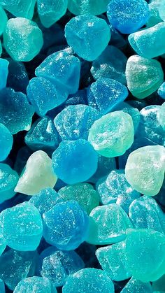 blue and green sea glass is shown in close up