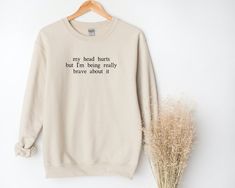 My Head Hurts but I'm Being Really Brave About It - Etsy Cotton Sweatshirt With Graphic Print And Comfortable Fit, Comfortable Cotton Sweatshirt With Graphic Print, Crew Neck Cotton Sweater With Slogan, Cotton Crew Sweater With Slogan, Cotton Crew Neck Sweater With Slogan, Cotton Sweater With Slogan, Relaxed Fit, Relaxed Fit Cotton Sweater With Slogan, My Head Hurts, Feminism Shirt