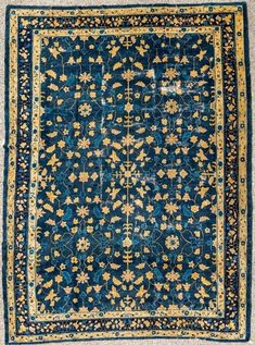 This fabulous antique 1880s Chinese Peking rug captures the essence of a blue sea, featuring an enchanting allover pattern of meandering vines and delicate floral motifs, intricately handwoven into a stunning piece of floor art. The color palette of this amazing rug is simply enthralling. Different shades of blue blend Extra Large Rugs, Allover Pattern, Floor Art, Color Stories, Ancient Chinese, Floral Motifs, Cool Rugs, Blue Sea, Floral Motif