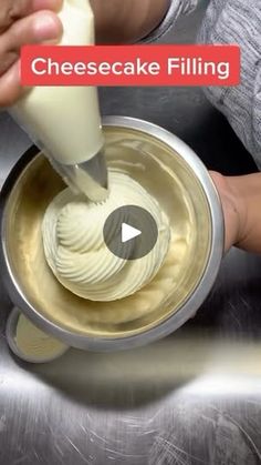 a person pouring cheesecake filling into a bowl