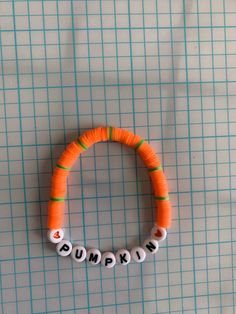 This bracelet comes in different sizes. Fun Orange Jewelry For Halloween, Fun Orange Halloween Jewelry, Novelty Orange Bracelets For Halloween, Halloween Novelty Orange Bracelets, Fun Adjustable Jewelry For Halloween, Handmade Casual Halloween Jewelry, Casual Handmade Halloween Jewelry, Casual Handmade Jewelry For Halloween, Fun Orange Bracelets For Gifts