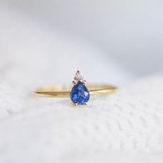 A 14K gold ring with a natural sapphire gemstone pear cut and a diamond brilliant cut in white gold or in yellow gold. A perfect engagement gold ring for women, stacking and delicate that adds glam to every outfit. Sapphire is the birthstone of September. 100% handcrafted with love!D E T A I L S● Metal: 14K solid white gold, 14K gold, 14K rose gold● Gemstones: Sapphire, Diamond● Gemstones weight: Sapphire 0.4ct, Diamond 0.02ct● Sapphire dimensions: 5.4 x 4.2 mmR I N G ∙ S I Z I N GFor General Re Fine Jewelry Pear-shaped Sapphire Ring, Pear-shaped Birthstone Promise Ring, Pear-shaped Sapphire Ring, Fine Jewelry Sapphire Ring With Pear Shape, Yellow Gold Teardrop Sapphire Ring Fine Jewelry, Teardrop Sapphire Ring In Yellow Gold, Teardrop Yellow Gold Sapphire Ring, Pear-shaped Sapphire Gemstone Rings, 14k Gold Pear-shaped Promise Diamond Ring