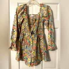 Nwt Never Been Worn! It’s Really Cute, But I’ve Never Had Anywhere To Wear It. Multicolor Long Sleeve Jumpsuits And Rompers For Spring, Spring Long Sleeve Jumpsuits And Rompers For Vacation, Multicolor Long Sleeve Jumpsuit For Summer, Summer Floral Print Long Sleeve Jumpsuits And Rompers, Long Sleeve Floral Jumpsuits And Rompers For Summer, Long Sleeve Floral Jumpsuit For Summer, Spring Multicolor Cotton Jumpsuits And Rompers, Trendy Yellow Jumpsuits And Rompers For Spring, Long Sleeve Jumpsuits And Rompers For Spring Brunch