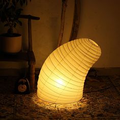 a lamp that is sitting on the ground