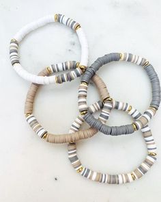 Cheap White Polymer Clay Beaded Bracelets, Neutral Beads Bracelets, Aztec Clay Bead Bracelet, Beaded Bracelets Neutral Colors, Colorful Heishi Bracelet, Neutral Jewelry Aesthetic, Flat Beaded Bracelet Ideas, Clay Bracelets Color Combos, Clay Bead Bracelet Ideas For Women