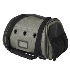 a grey and black bag with eyes on it