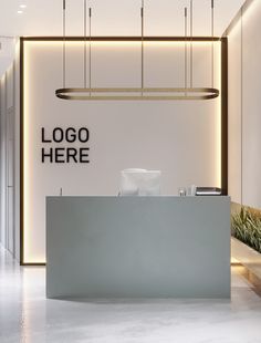 an office lobby with a white reception desk